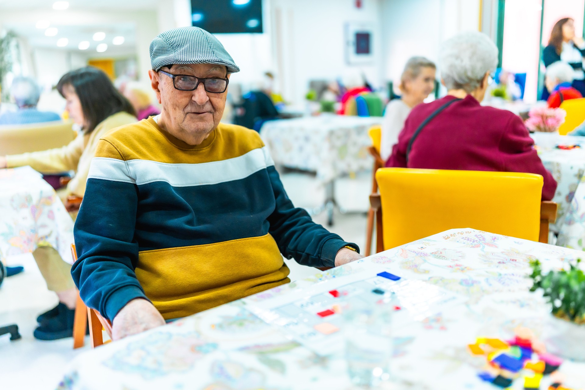 Senior man enjoying recreational activities in nursing home
